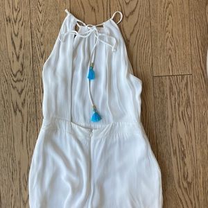 Karina Grimaldi romper with blue tassles